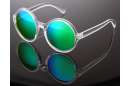 Transparente runde Sonnenbrille mit verspiegelten Gläsern